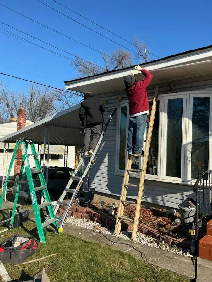 Restoration crew performing exterior repair in Conway
